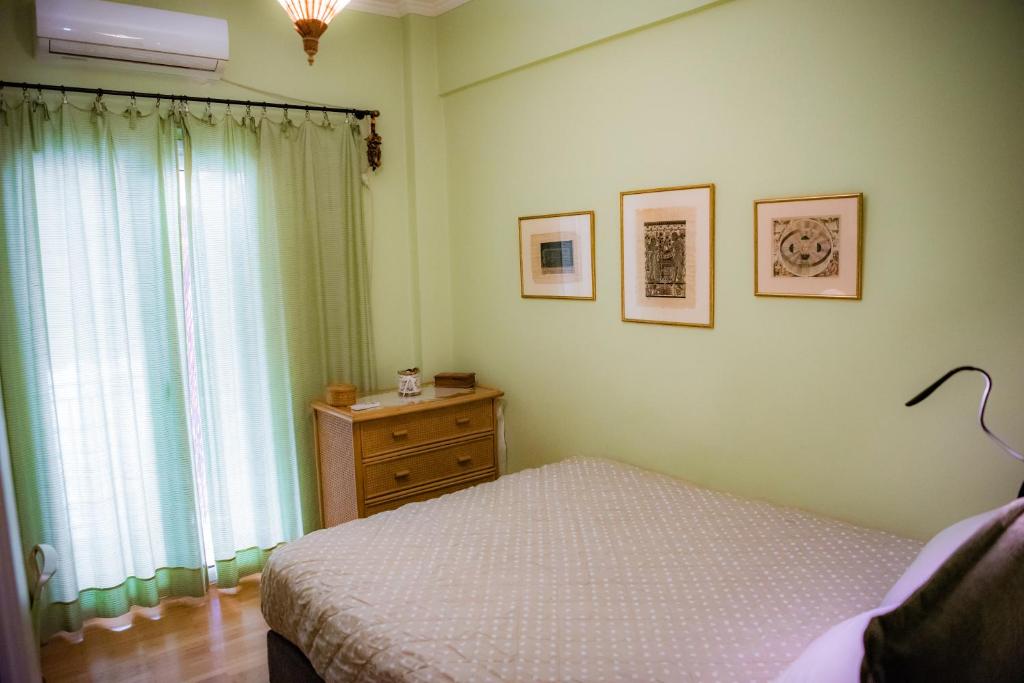 Posteľ alebo postele v izbe v ubytovaní Sophie's Penthouse in Athens