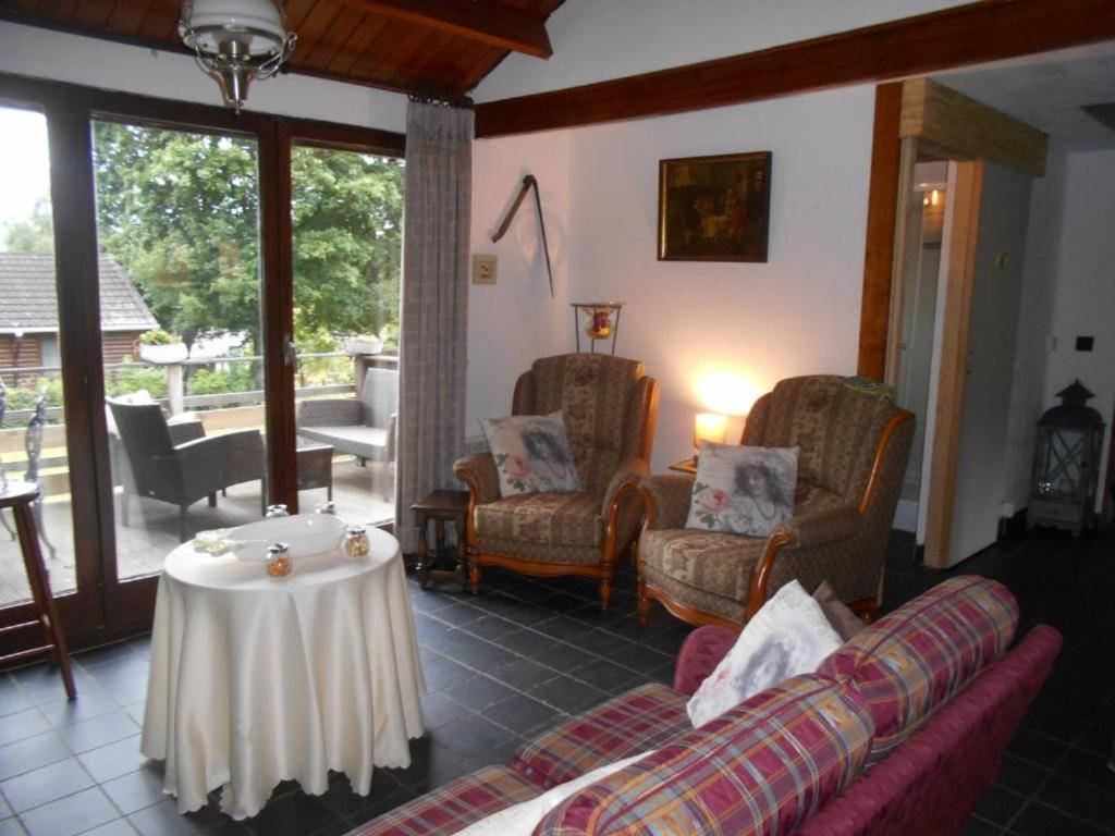 Posezení v ubytování Vakantiehuis Malaika