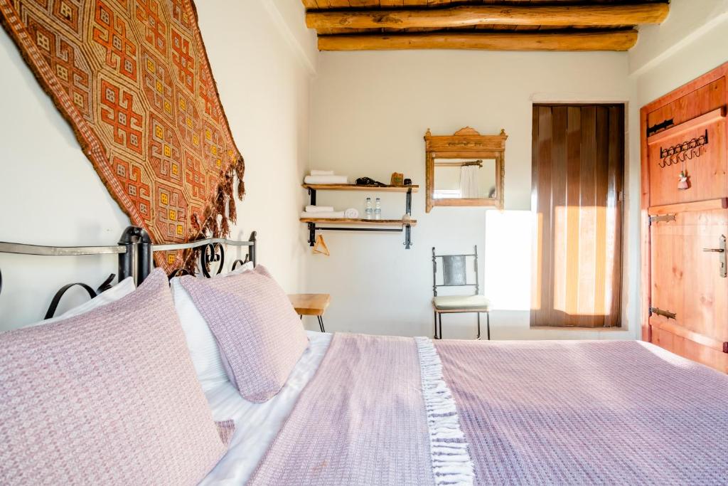 Postel nebo postele na pokoji v ubytování Zen Cappadocia