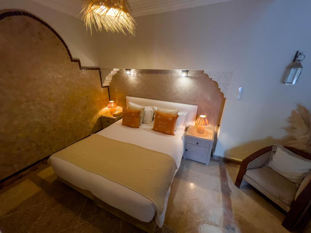 Postel nebo postele na pokoji v ubytování Riad Jonan & Spa