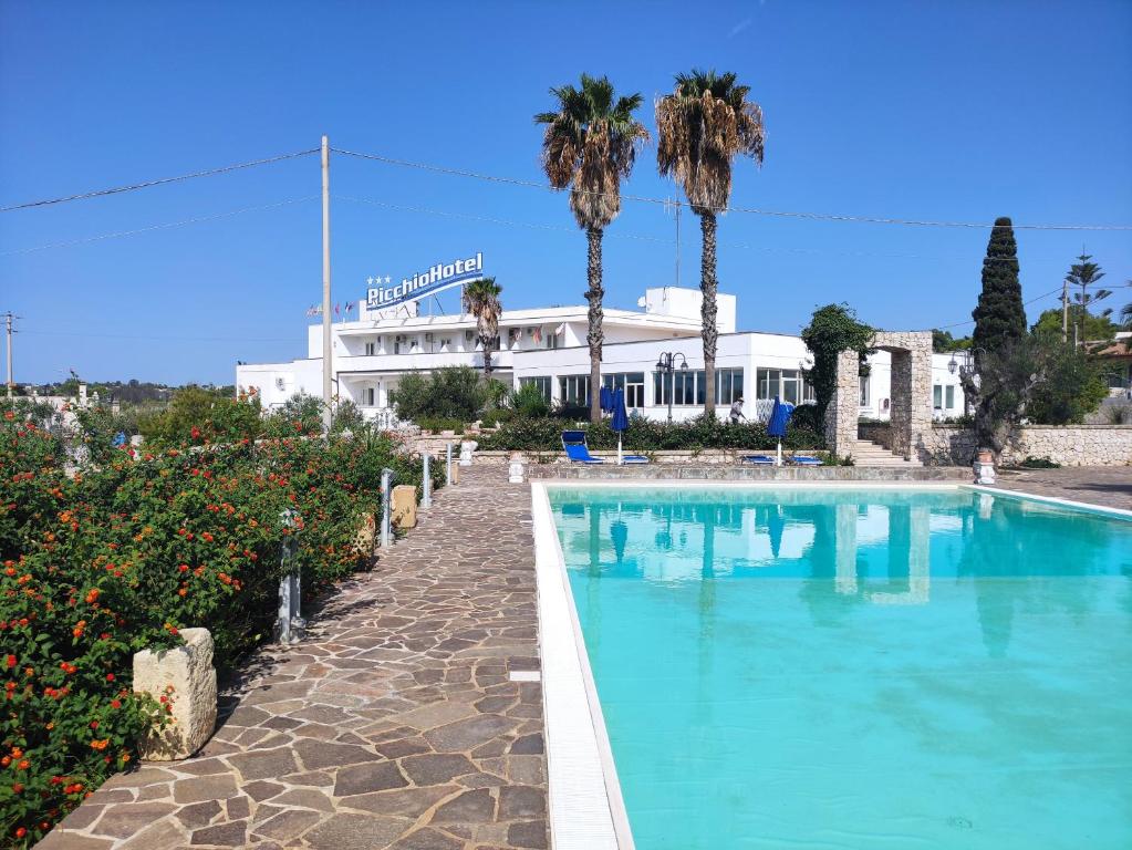 Bazén v ubytování Picchio Hotel Pescoluse nebo v jeho okolí