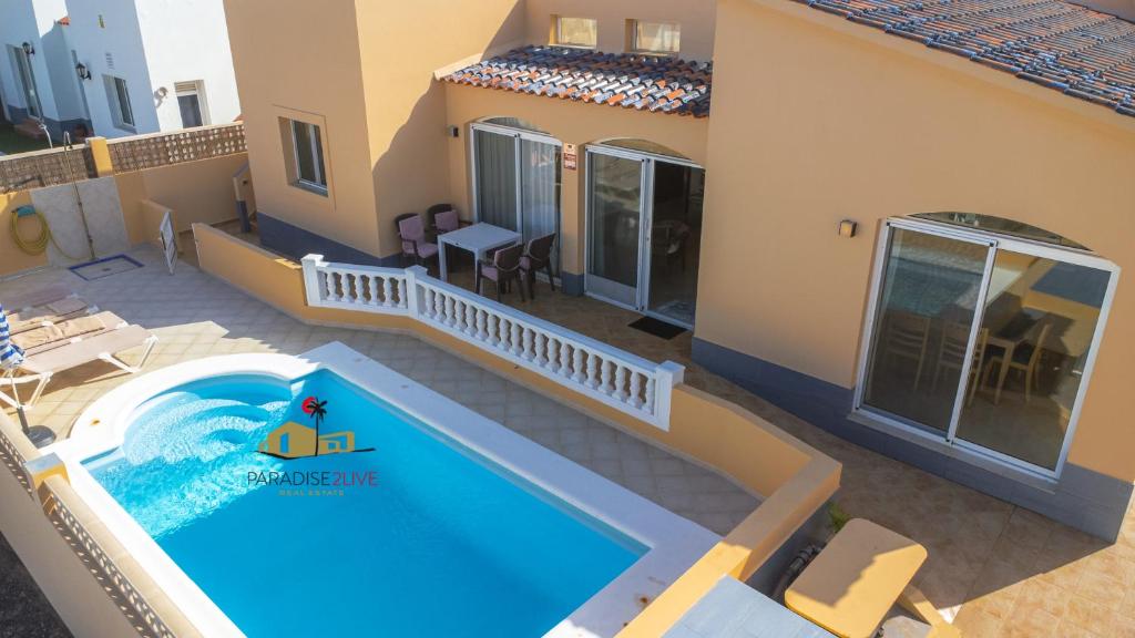 an overhead view of a house with a swimming pool at Villa Bonita in Corralejo