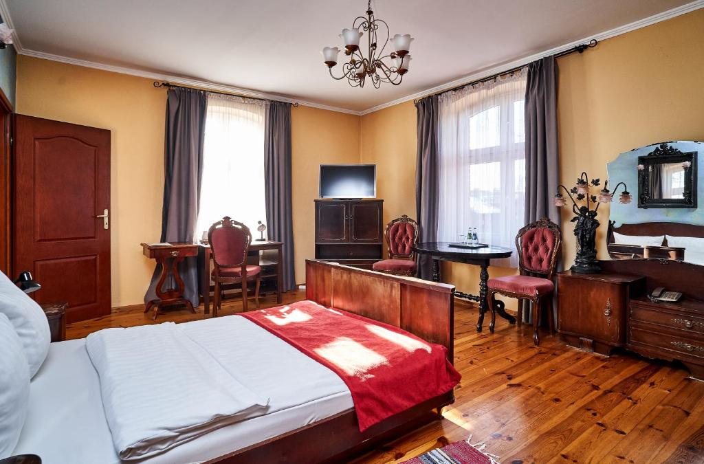 Postel nebo postele na pokoji v ubytování Hotel Stara Poczta