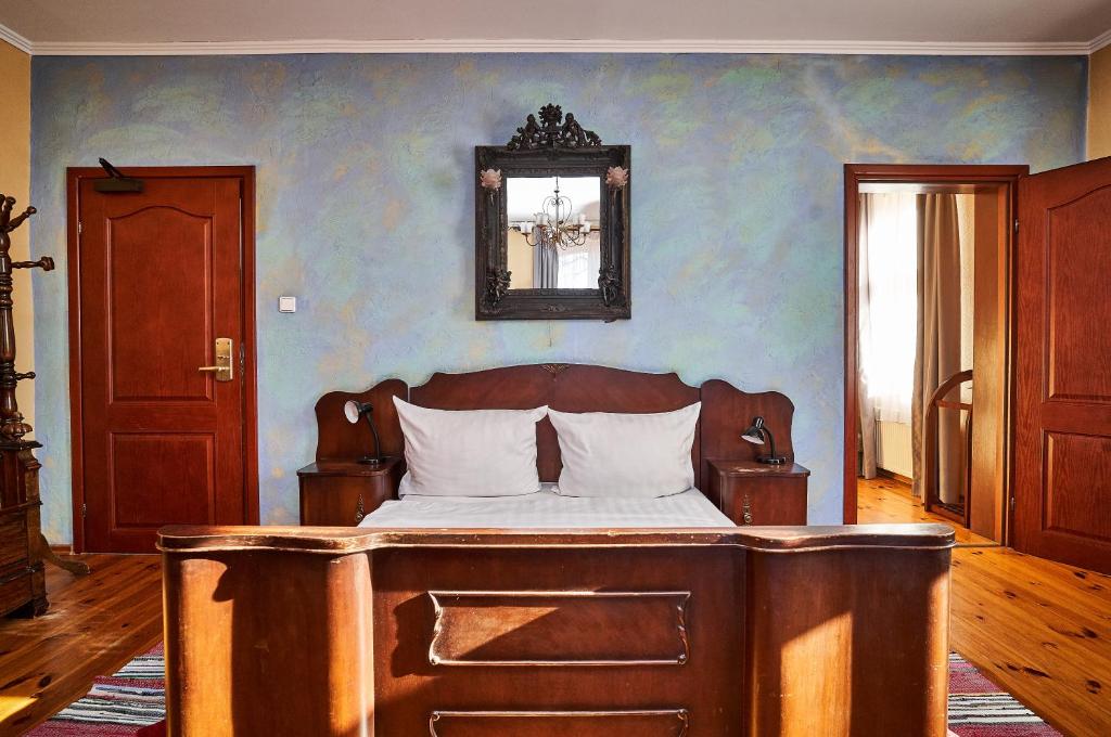 Postel nebo postele na pokoji v ubytování Hotel Stara Poczta