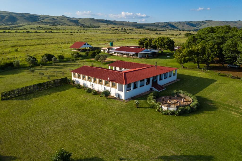 an aerial view of a house in a field at The Cowshed in Lydenburg