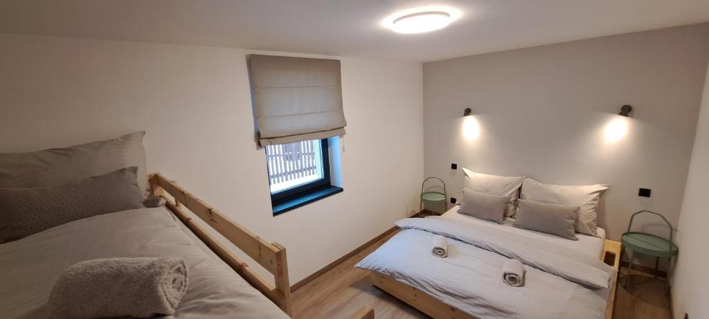 Postel nebo postele na pokoji v ubytování Apartmány Staroměstská romance