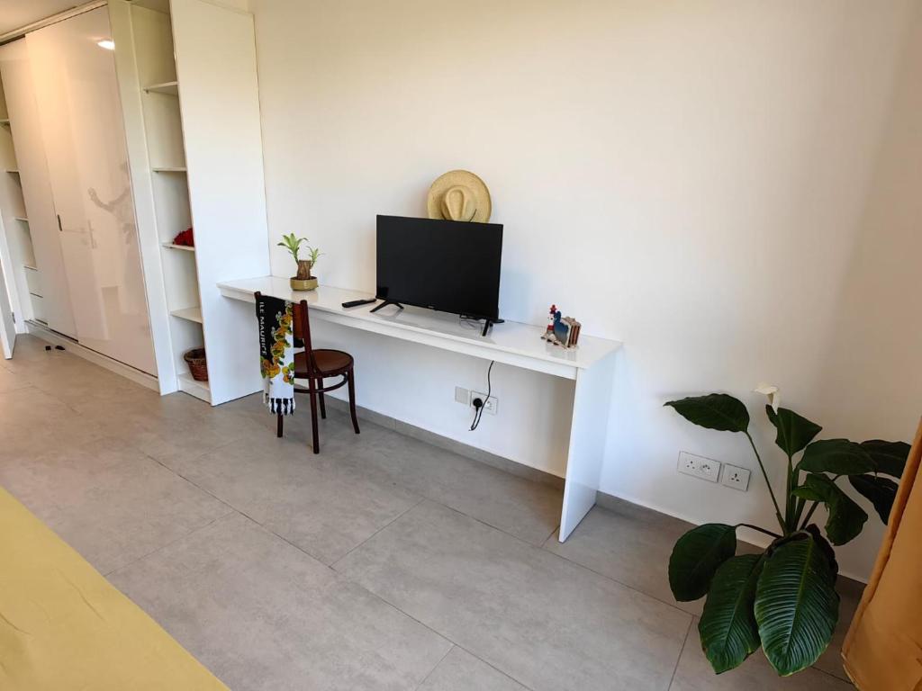 TV a/nebo společenská místnost v ubytování J'Vais Residence by SOV