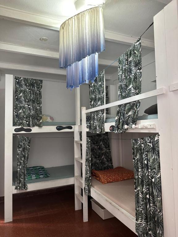 Postel nebo postele na pokoji v ubytování Agüita House