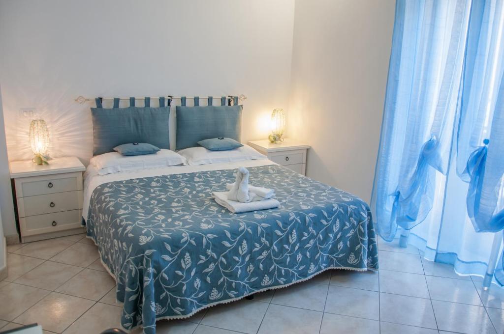 Posteľ alebo postele v izbe v ubytovaní Bed & Breakfast ALLA LOGGETTA
