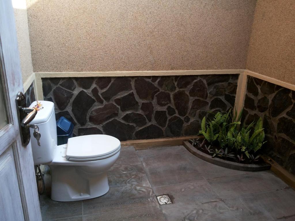 Koupelna v ubytování Ode Resto Guesthouse