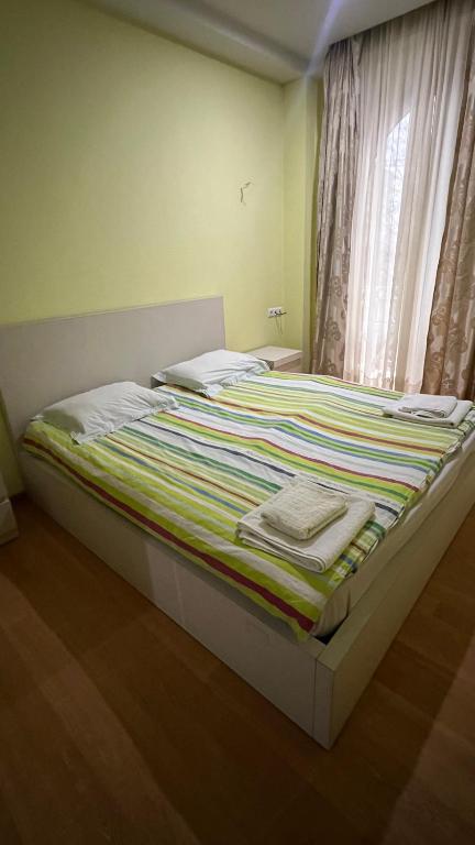Postel nebo postele na pokoji v ubytování Rest House Tbilisi