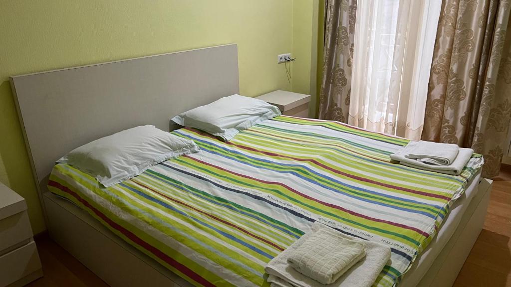 Postel nebo postele na pokoji v ubytování Rest House Tbilisi