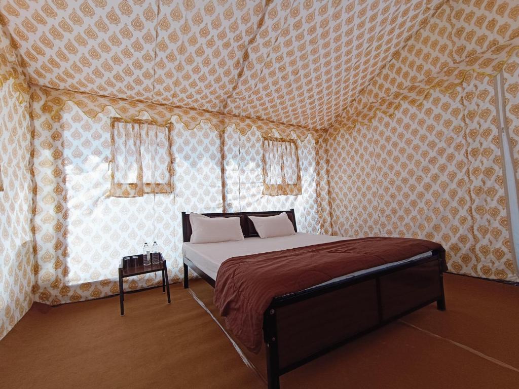 Postel nebo postele na pokoji v ubytování Rann Heritage Resort