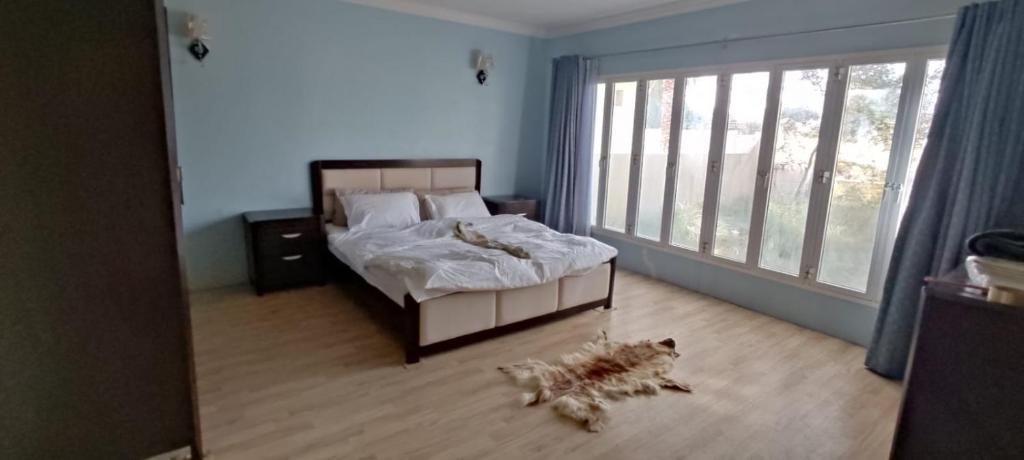 Postel nebo postele na pokoji v ubytování Hostel Dar Alslam