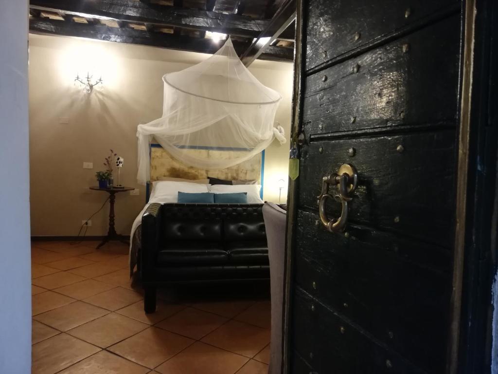 A bed or beds in a room at Apartments Campo de Fiori