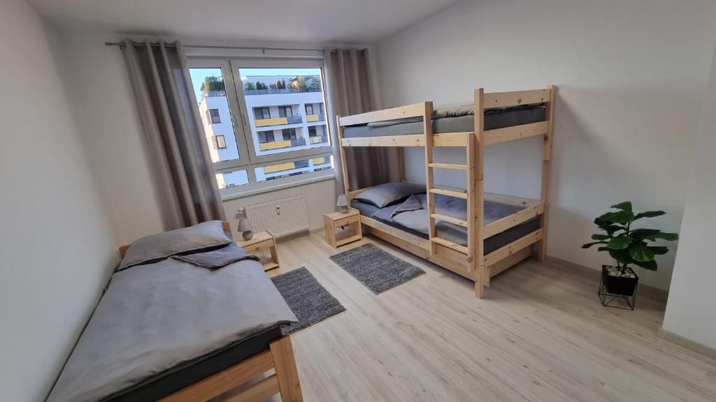 Postel nebo postele na pokoji v ubytování Apartmán 402