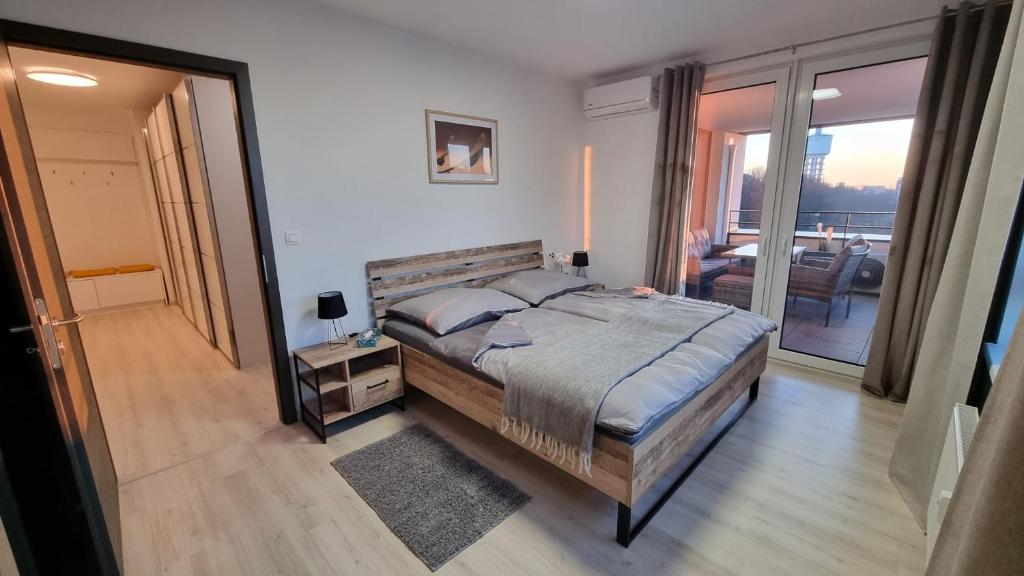 Postel nebo postele na pokoji v ubytování Apartmán 402