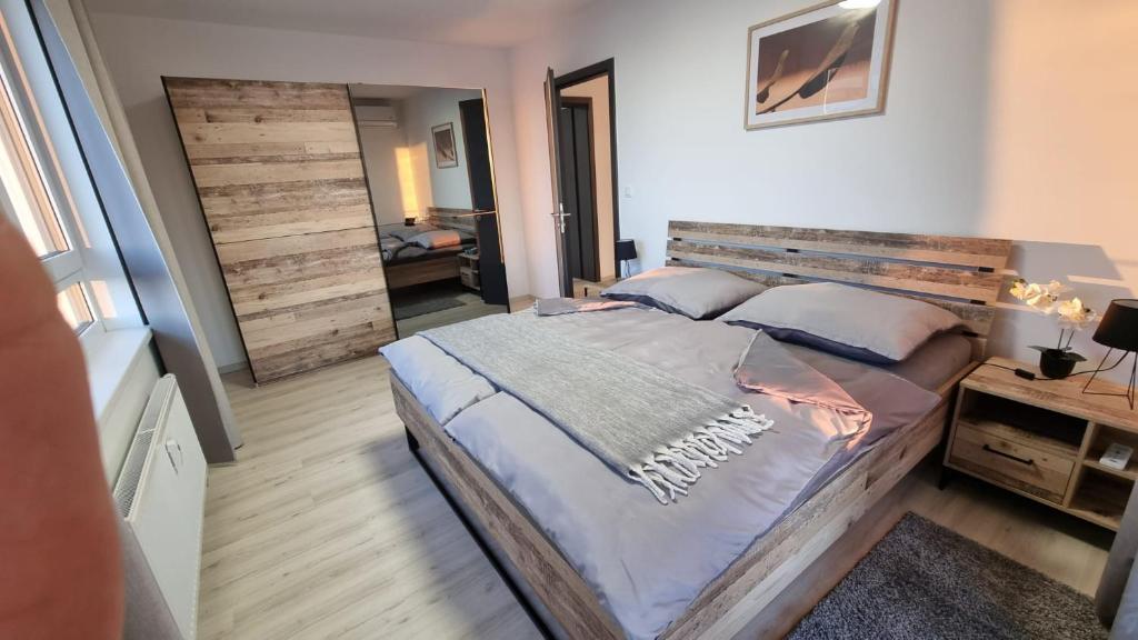 Postel nebo postele na pokoji v ubytování Apartmán 402