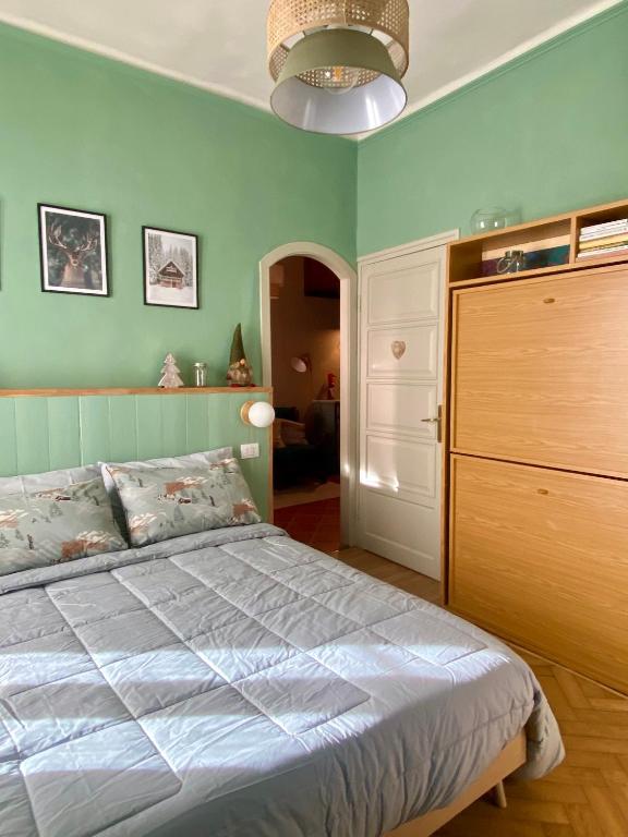 Postel nebo postele na pokoji v ubytování Bilocale a due passi dal centro