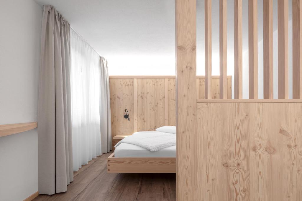 Postel nebo postele na pokoji v ubytování Appartamenti Residence Ada