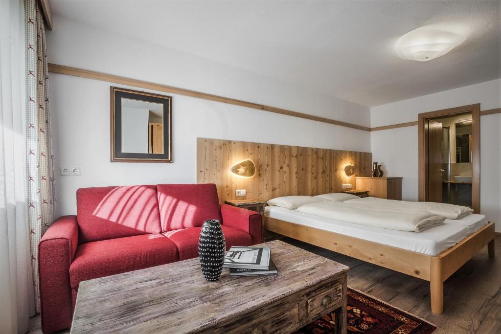 Postel nebo postele na pokoji v ubytování Appartamenti Residence Ada