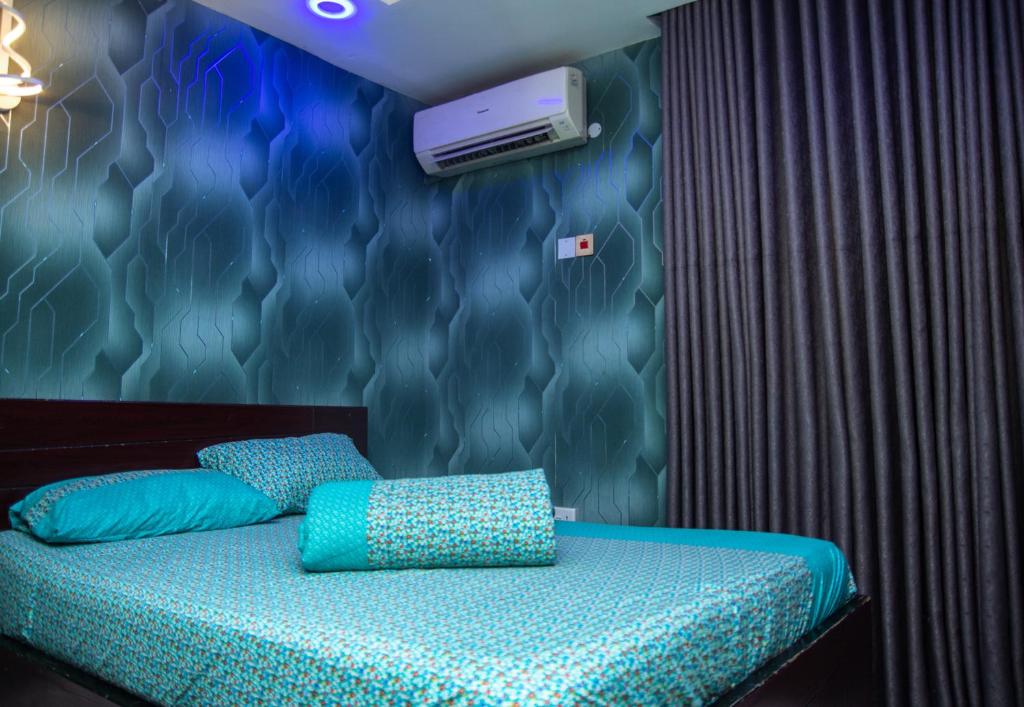 Postel nebo postele na pokoji v ubytování Haffy Executive Hotels and Suite