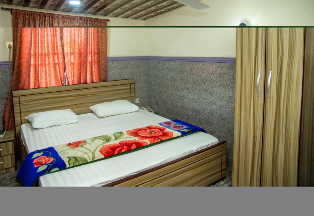 Postel nebo postele na pokoji v ubytování Haffy Executive Hotels and Suite
