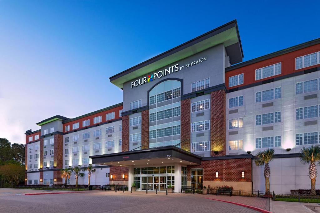 una representación de un hotel en la parte delantera del edificio en Four Points by Sheraton Houston West en Houston