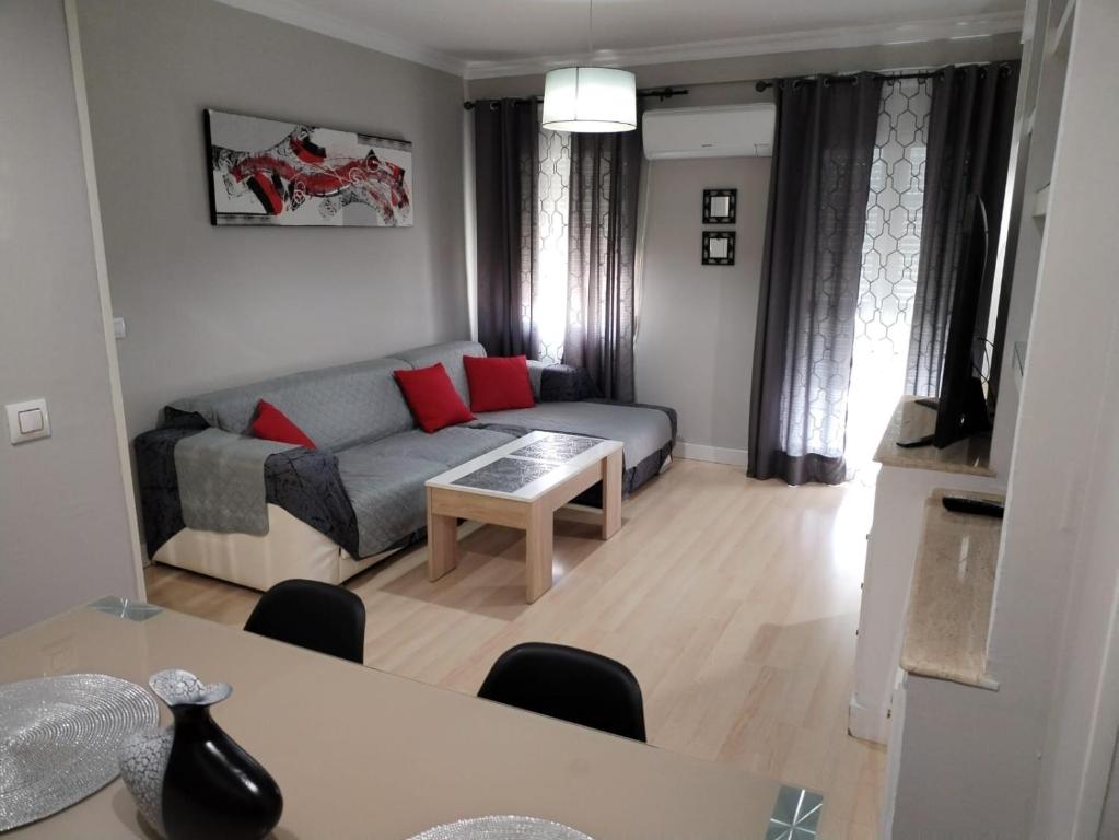 Posedenie v ubytovaní Apartamento con parking privado gratis incluido