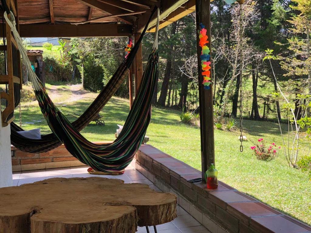 Zahrada ubytování Casa Rustica con chimenea en su interior, rodeado de los cuatro elementos tierra, fuego, aire y agua, ubicada en sector tranquilo, para descansar en familia o amigos,