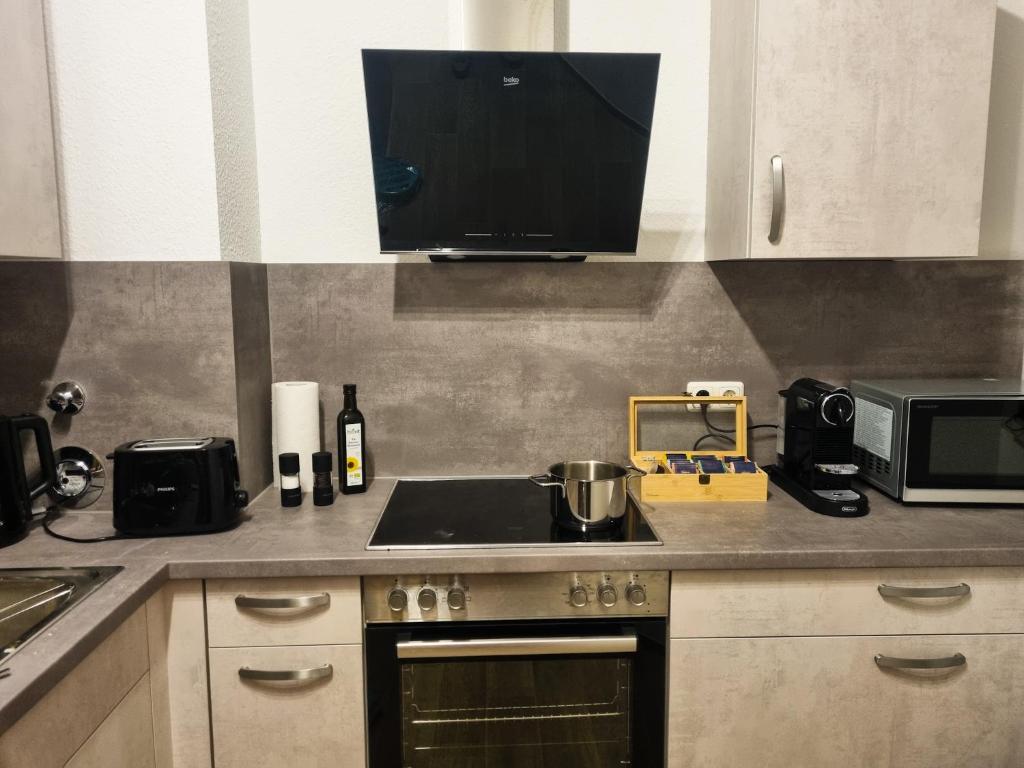 Köök või kööginurk majutusasutuses maremar - Design Maisonette Altstadt - 4 Pers - 57qm - Luxus Boxspringbett - Küche - Arbeitsplatz - privater Parkplatz