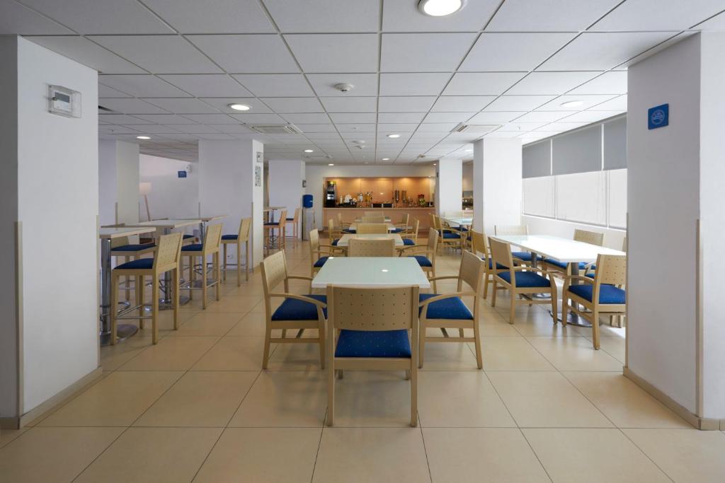 Un restaurante o sitio para comer en City Express by Marriott Puebla FINSA