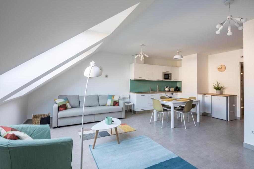 Kuchyň nebo kuchyňský kout v ubytování Stafétaház Apartmanok
