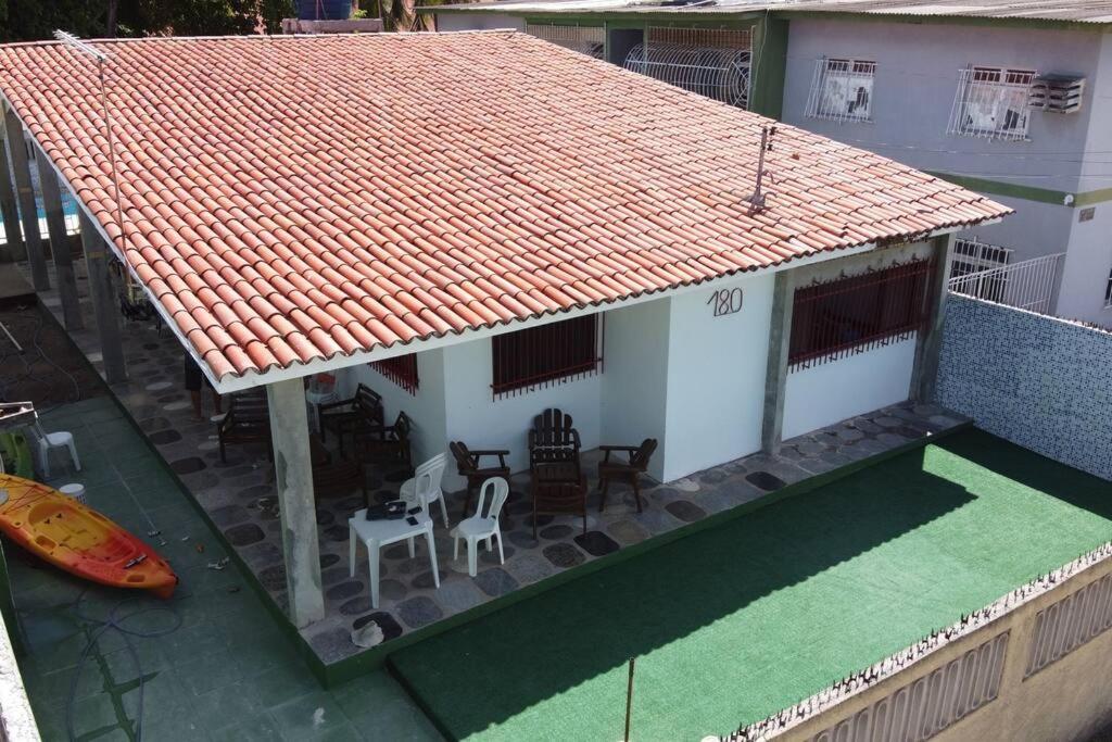 an overhead view of a house with a roof at Casa com Piscina em Itamaracá in Itamaracá