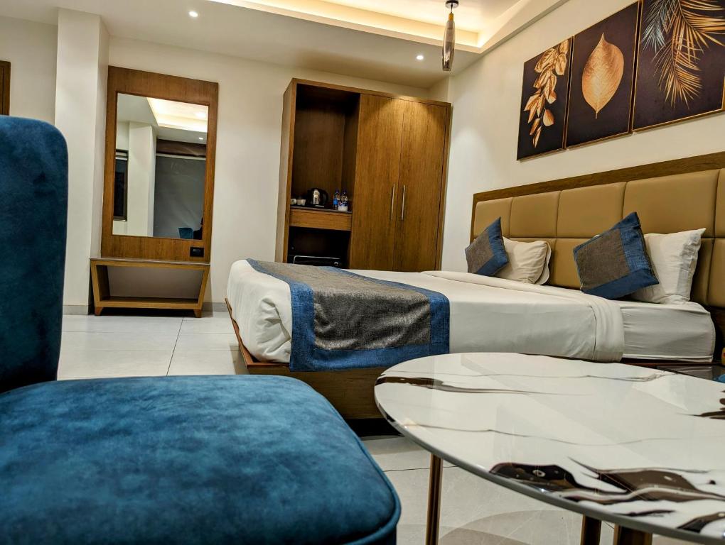 Posezení v ubytování Hotel Red Chillee Restro