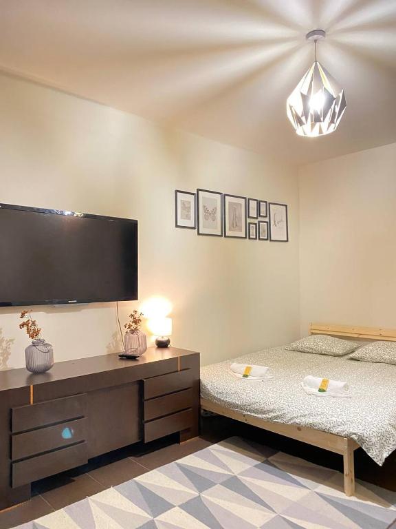 Кровать или кровати в номере HALBY rooms in the very CENTER of Warsaw