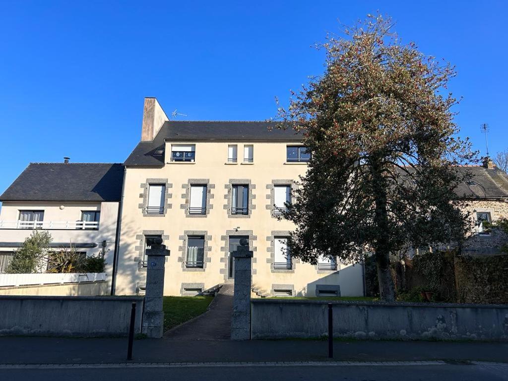 a large white building with a tree in front of it at L'Armateur, Pordic centre in Pordic