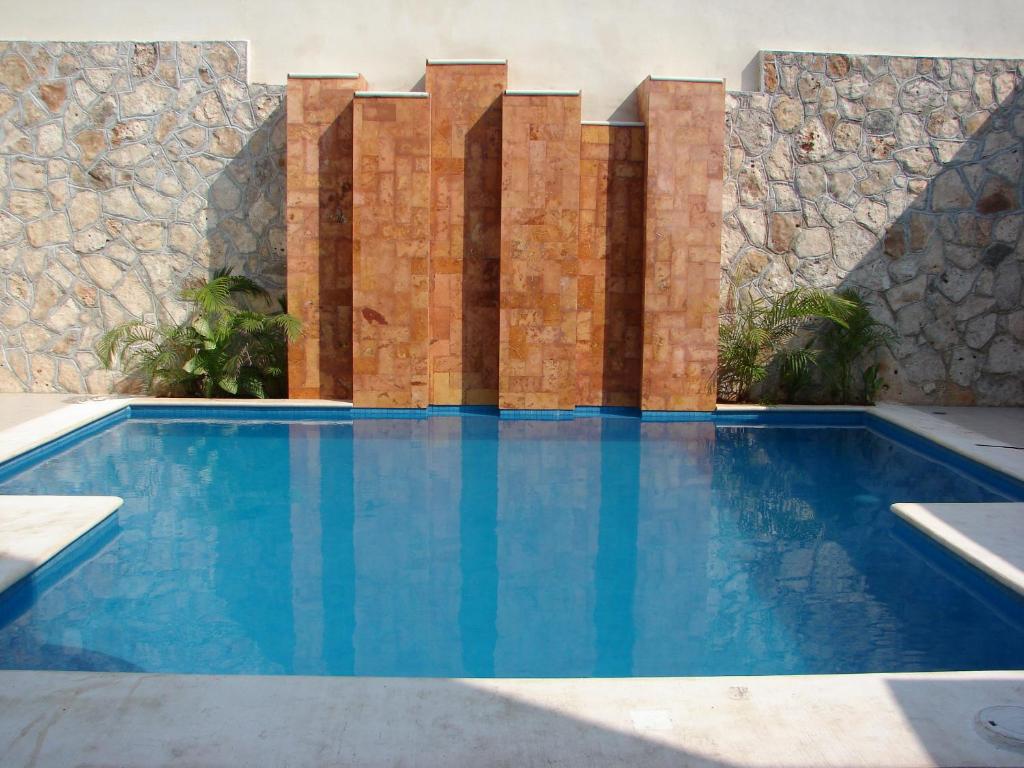 Bazén v ubytování Hotel Lopez Campeche nebo v jeho okolí