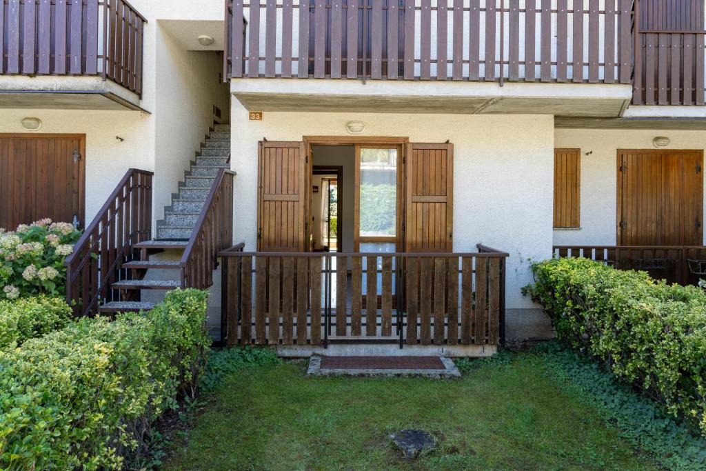 Villetta a schiera con giardino privato - Villa De Un Dormitorio