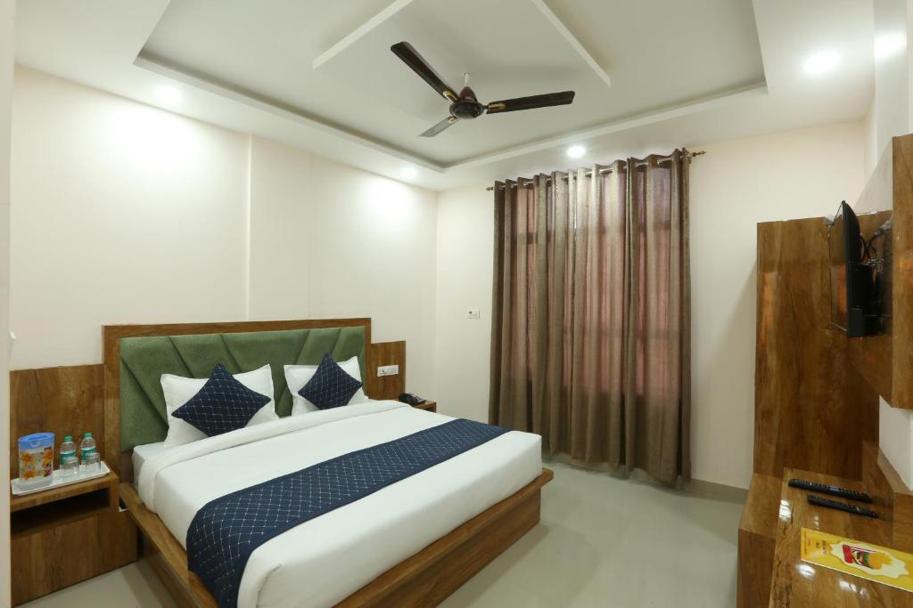Giường trong phòng chung tại Hotel Katra Hills
