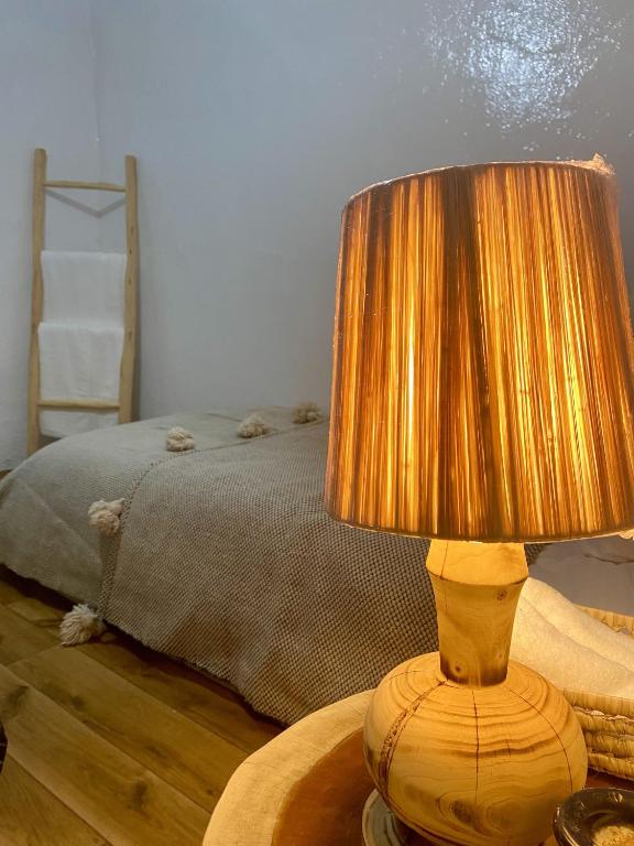Postel nebo postele na pokoji v ubytování Riad La perle de Bacha