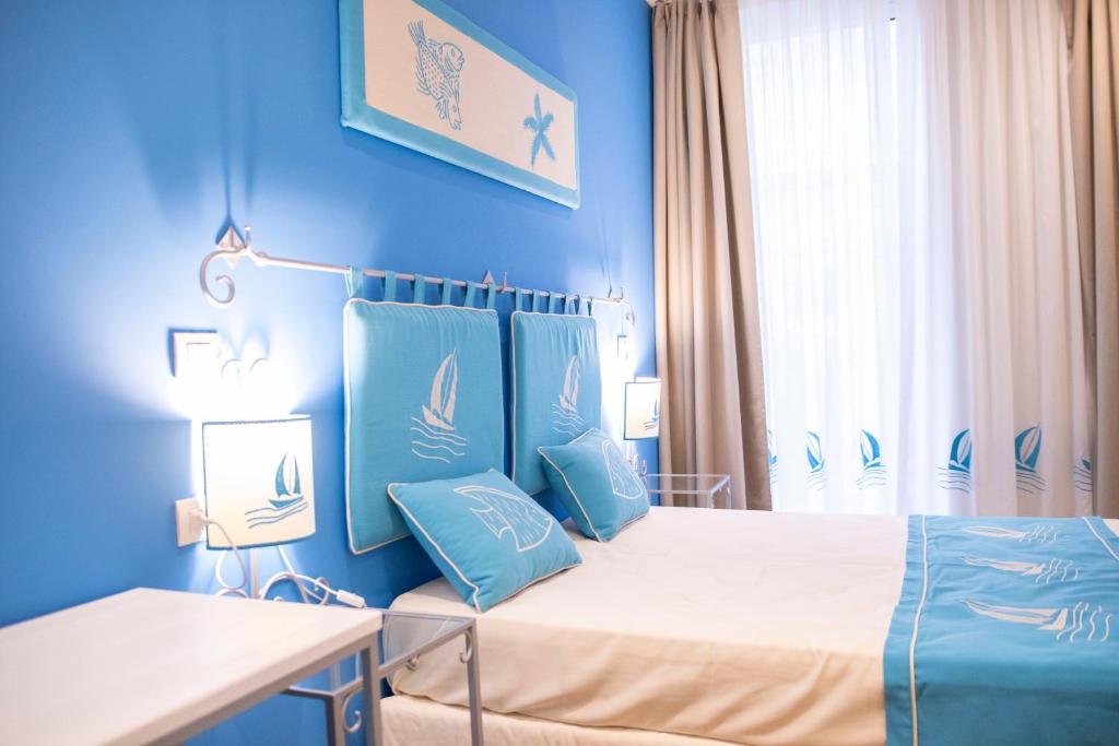 Postel nebo postele na pokoji v ubytování Berry Rooms