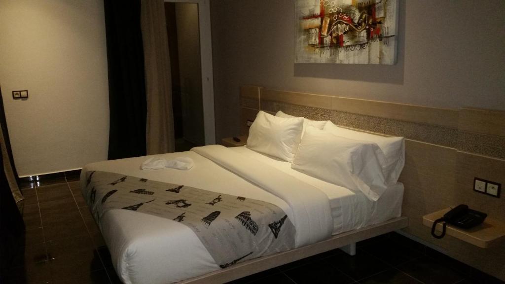 Voodi või voodid majutusasutuse Hotel A44 toas