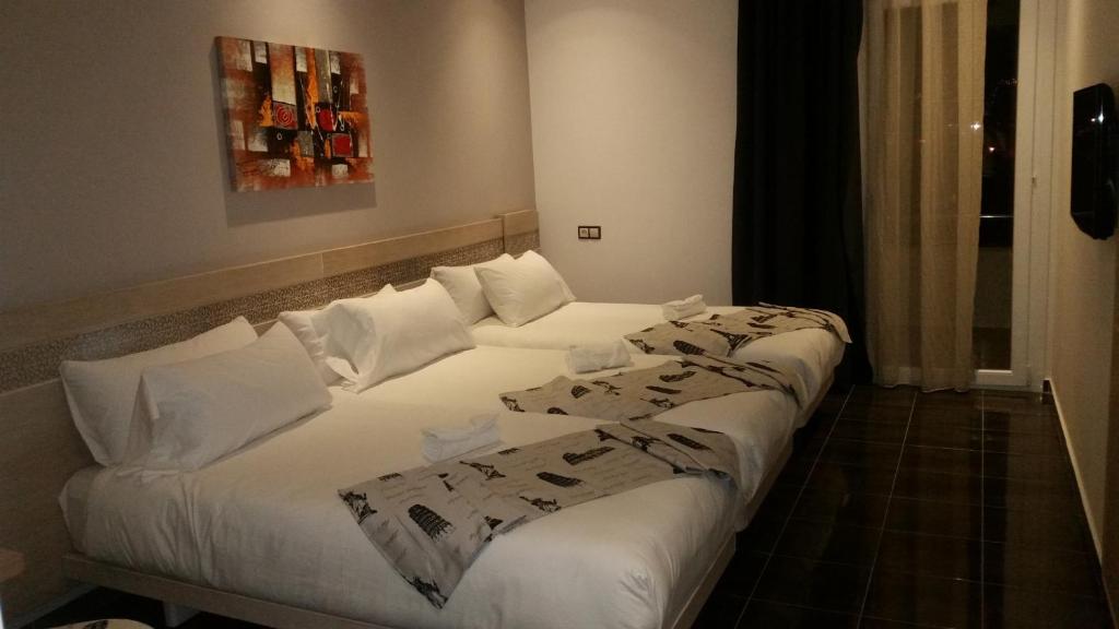 Voodi või voodid majutusasutuse Hotel A44 toas