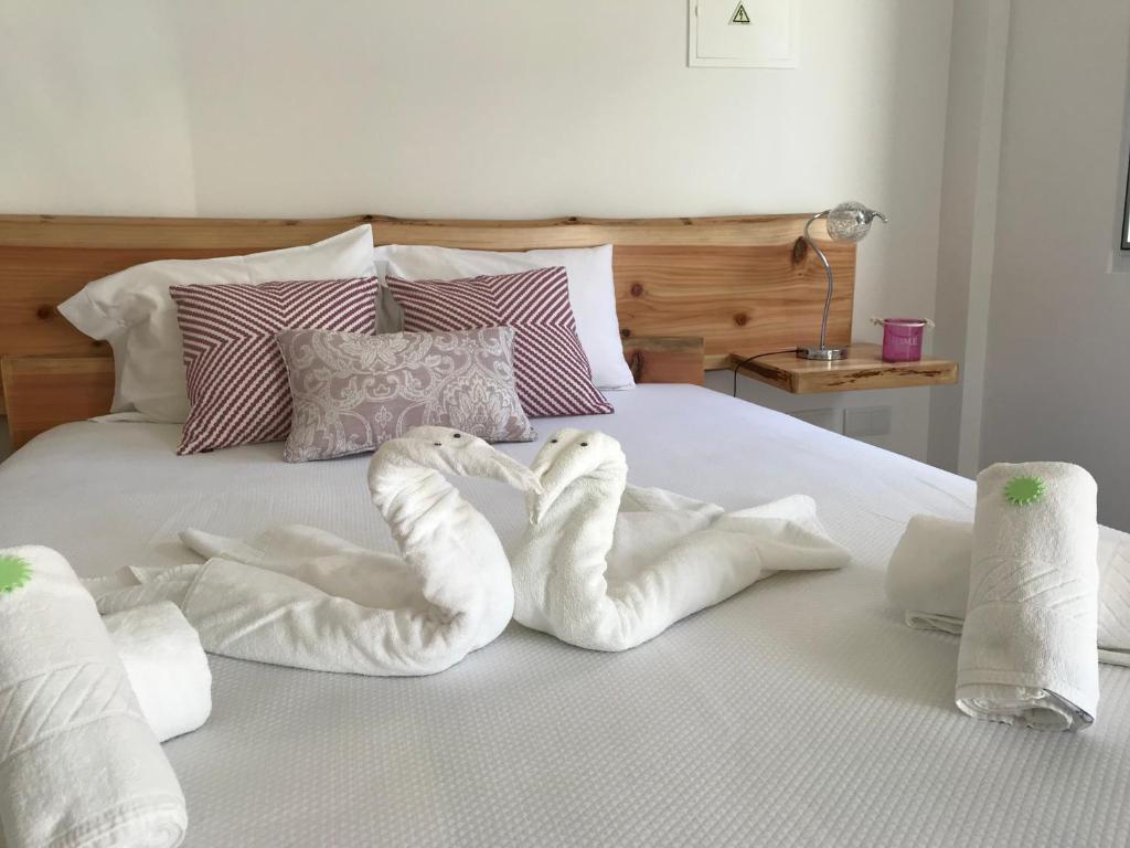 Кровать или кровати в номере Ninho do Monte