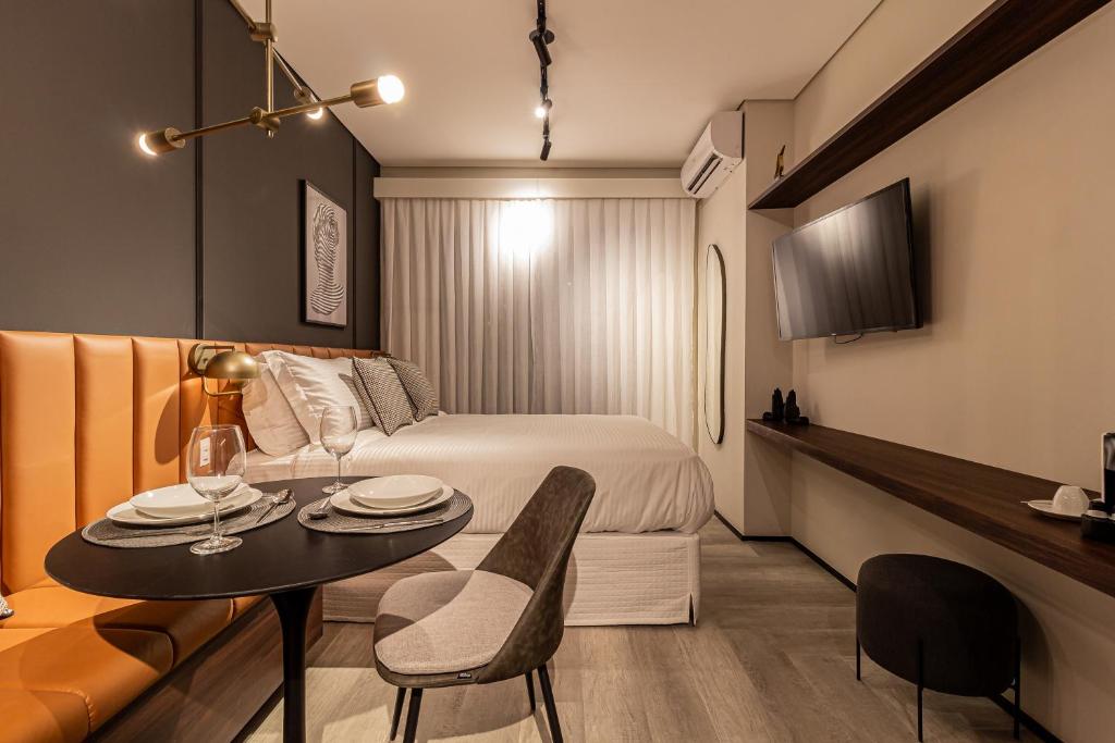 TV a/nebo společenská místnost v ubytování Iconyc Charlie Ibirapuera Hotel