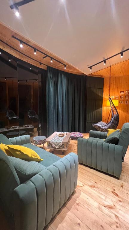 Posezení v ubytování Glamping Martini Kvariati