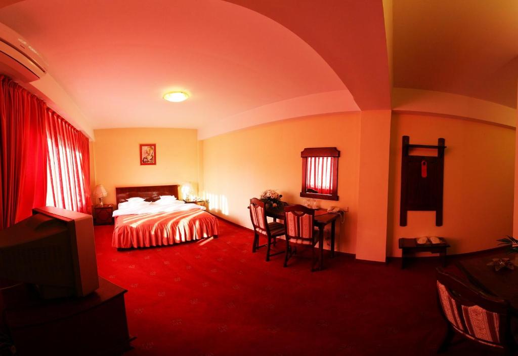 Postel nebo postele na pokoji v ubytování Hotel Premier