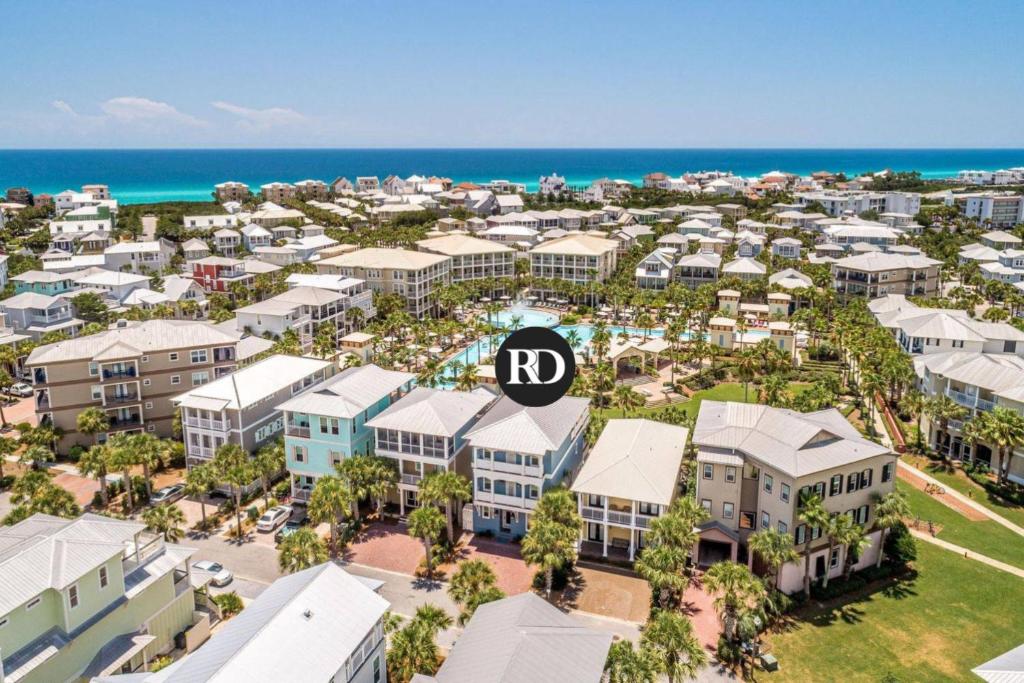 an aerial view of a resort with the ocean at All Decked Out in Panama City Beach