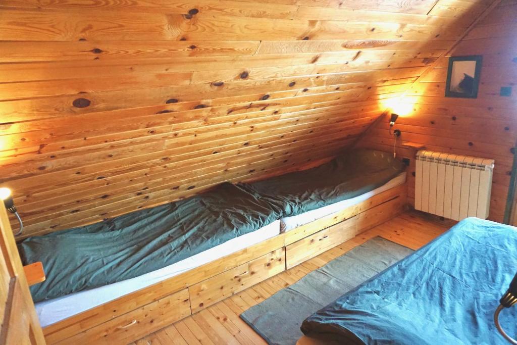 Postel nebo postele na pokoji v ubytování Guest House Montana